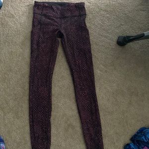 Lululemon size 4 full length tight side pockets and back zipper barely worn red
